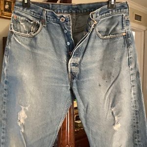 501 button up Levi’s. Very distressed, and has lots of wear left in them. 35/32
